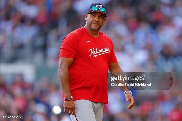 Manager Dave Martinez of the Washington Nationals returns to the dugout during the seventh inning against the Atlanta Braves at Truist Park on...
