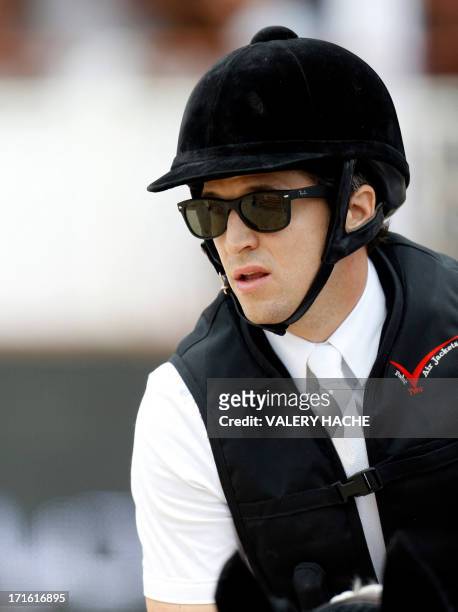 France's Guillaume Canet competes in the 2013 Monaco International Jumping as part of Global Champions Tour on June 27, 2013 in Monte-Carlo. AFP...