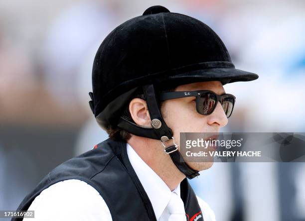 France's Guillaume Canet competes in the 2013 Monaco International Jumping as part of Global Champions Tour on June 27, 2013 in Monte-Carlo. AFP...