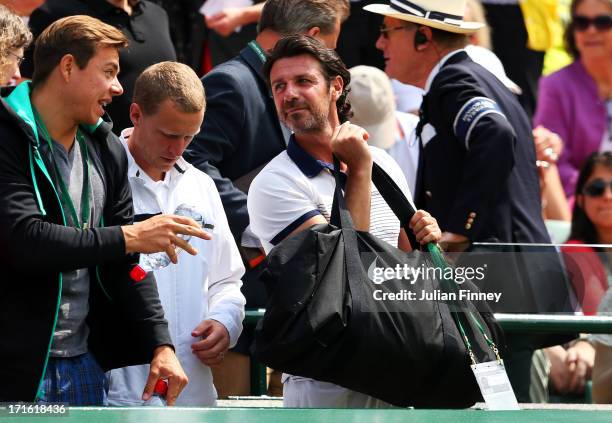 Patrick Mouratoglou, coach of Serena Williams of the United States of America attends her Ladies' Singles second round match against Caroline Garcia...