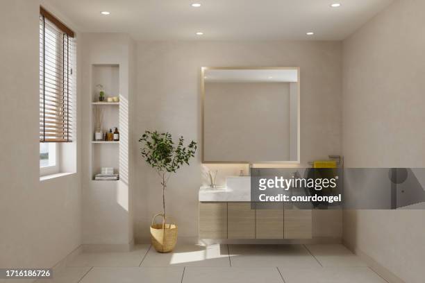 modernes badezimmer mit schrank, spiegel und topfpflanze - bathroom sink stock-fotos und bilder
