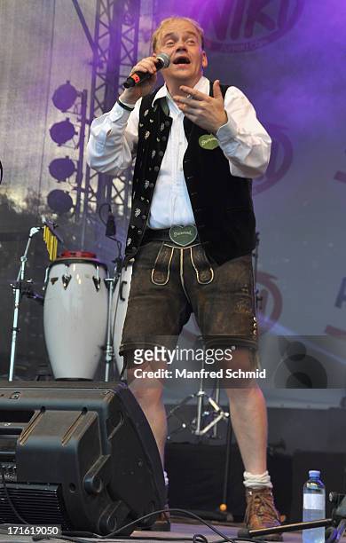 Fritz Kristoferitsch of Die Edlseer performs on stage during the 30th anniversary of Donauinselfest 2013 on June 23, 2013 in Vienna, Austria.