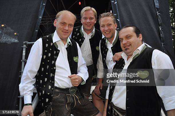 Fritz Kristoferitsch, Andreas Doppelhofer, Manfred Maier and Luigi Neuwirth of Die Edlseer pose backstage for a photograph during the 30th...