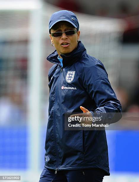 Hope Powell, manager of England gestures during the England Women v Japan Women - Womens' International Match at Pirelli Stadium on June 26, 2013 in...