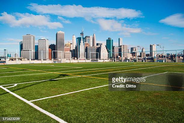 soccer fields and lower manhattan skyline, new york city, usa - local soccer field stock pictures, royalty-free photos & images
