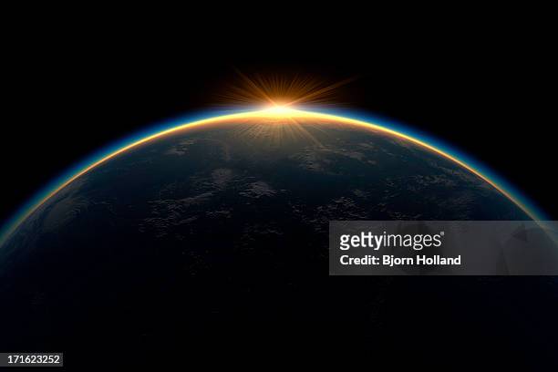 sunlight eclipsing planet earth - appearance foto e immagini stock