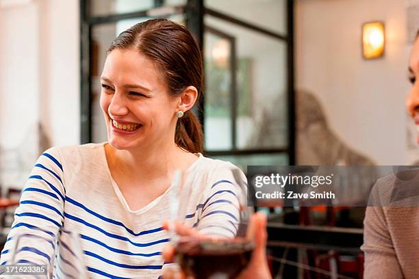 woman enjoying herself at wine bar - winebar stock pictures, royalty-free photos & images