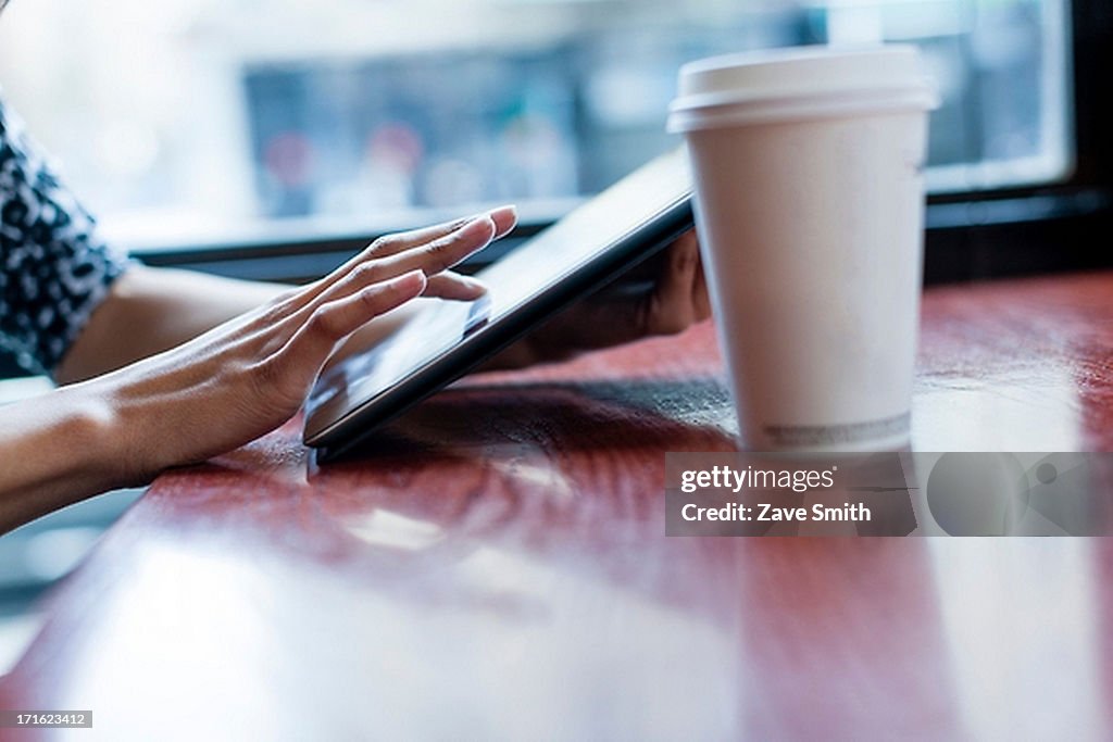 Woman using digital tablet