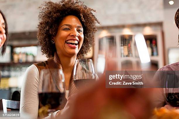 woman at restaurant laughing - wine bar stock pictures, royalty-free photos & images