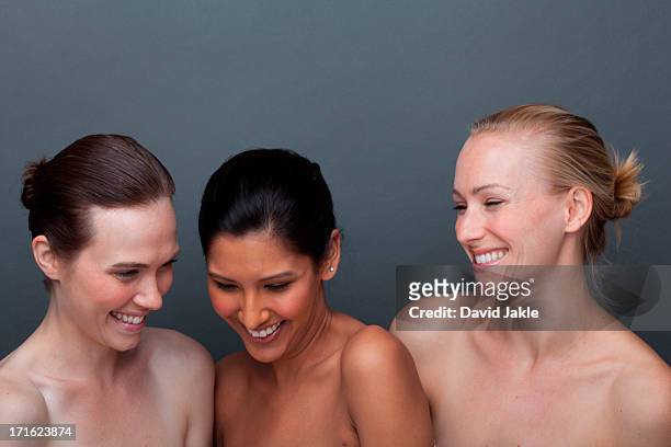 three young woman laughing - glendale california ストックフォトと画像