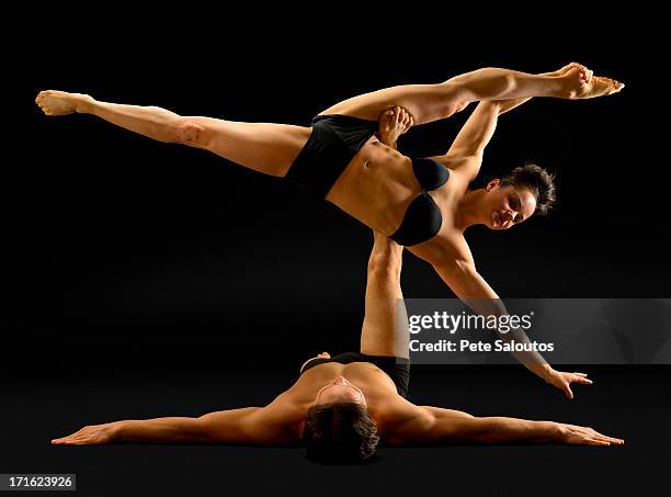 mid adult couple performing modern dance - men wearing bras photos stock pictures, royalty-free photos & images