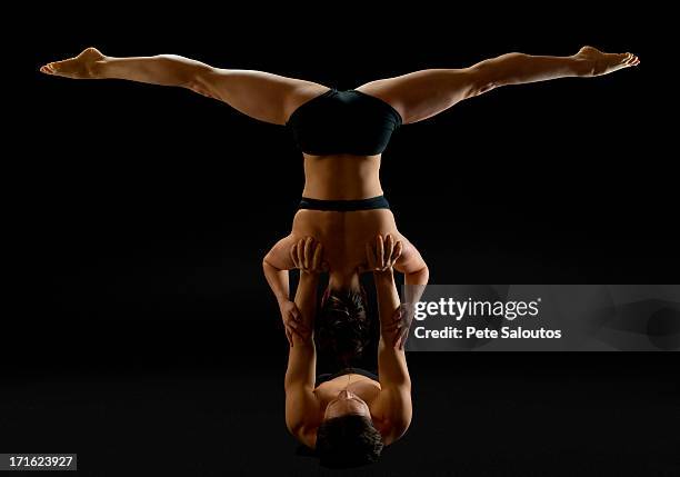 mid adult couple performing modern dance - men wearing bras photos stock pictures, royalty-free photos & images