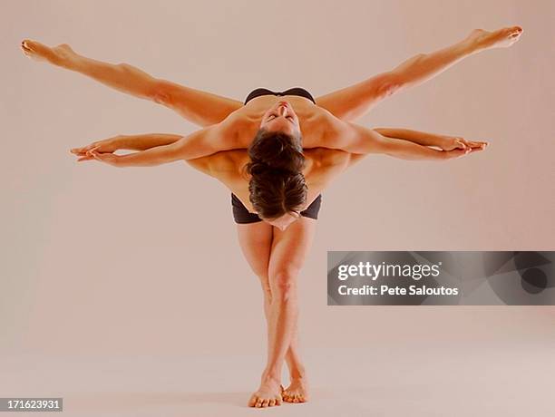 mid adult couple performing modern dance - artista del circo foto e immagini stock