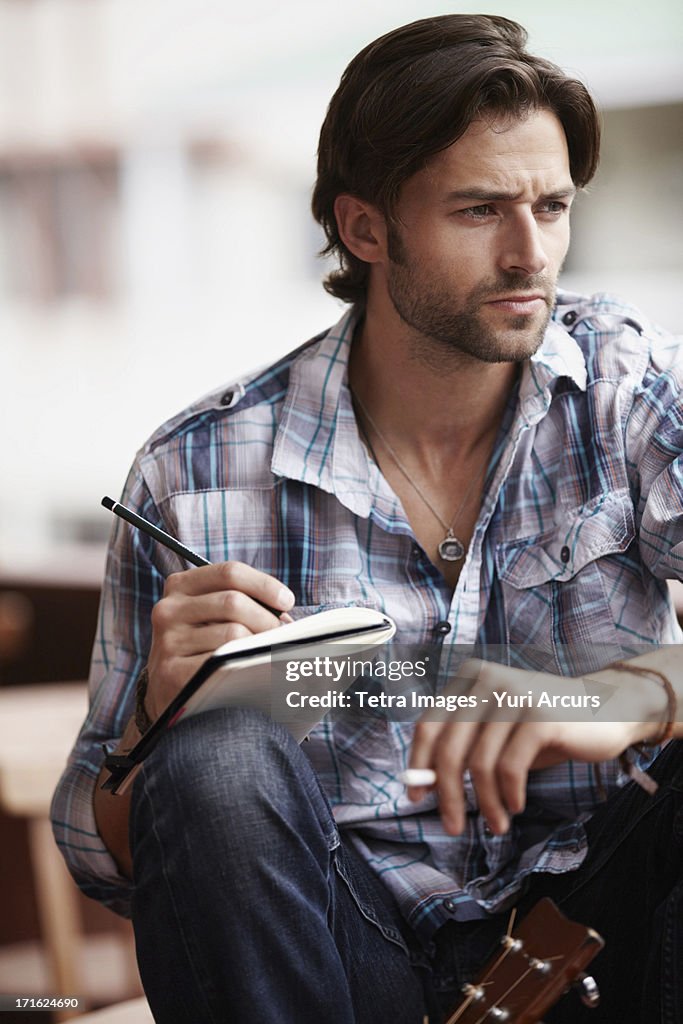 South Africa, Cape Town, Man doing notes