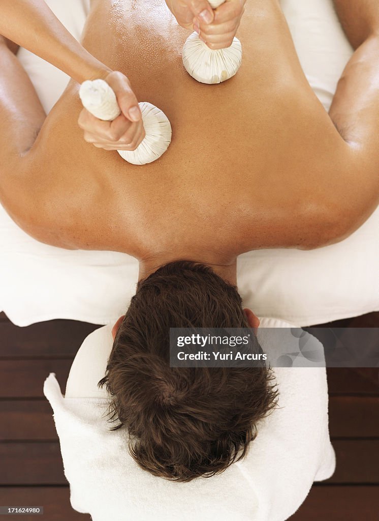 South Africa, Cape Town, Man getting massage in spa