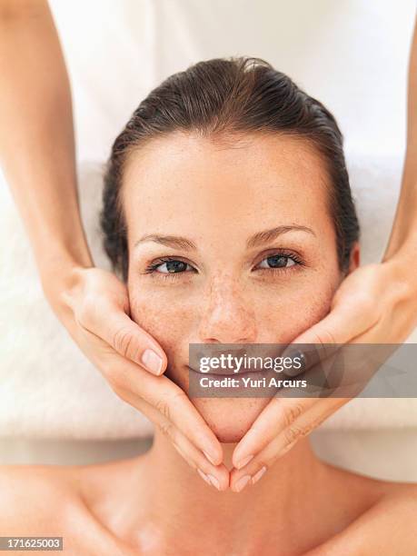south africa, cape town, woman relaxing in spa - massaggio del viso foto e immagini stock