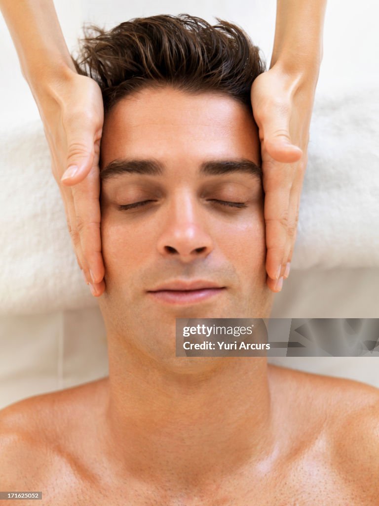 South Africa, Cape Town, Man receiving massage in spa