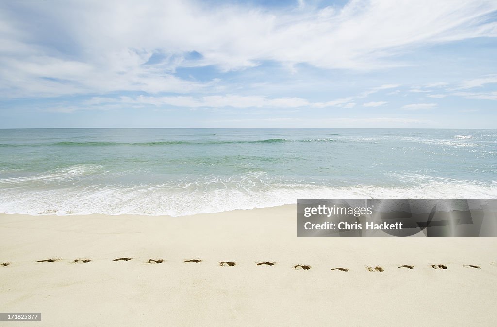 USA, Massachusetts, Footprints on empty beach