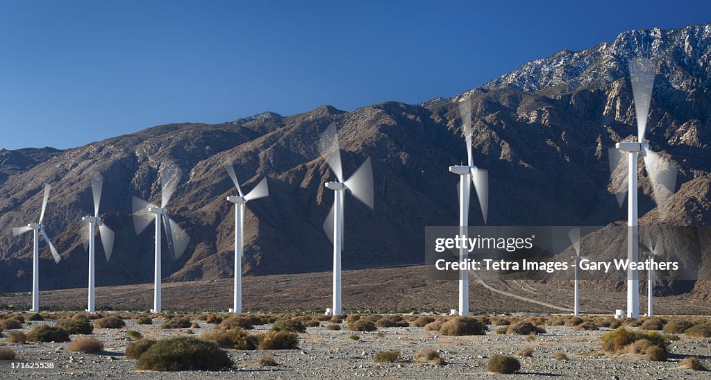 USA, California, Palm Springs, Wind turbines on desert