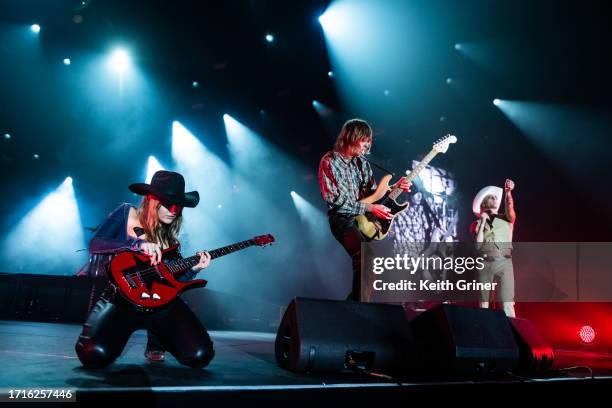 Victoria De Angelis, Thomas Raggi, and Damiano David of Måneskin performs at Nashville Municipal Auditorium on October 03, 2023 in Nashville,...