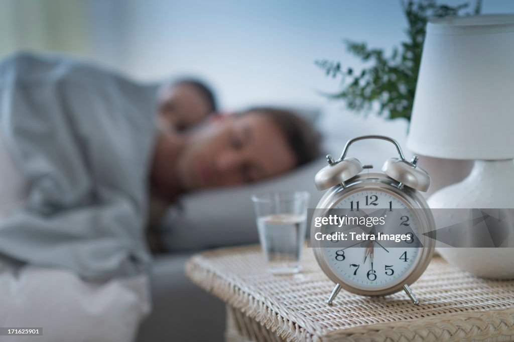 USA, New Jersey, Jersey City, Alarm clock in bedroom