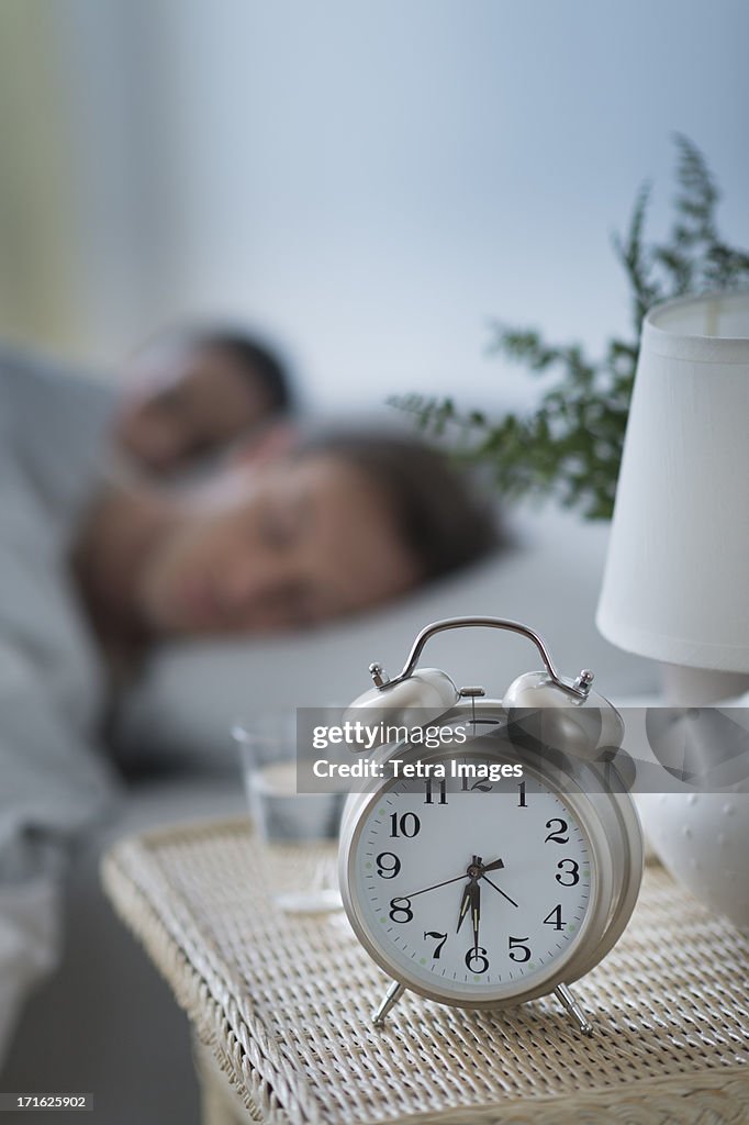 USA, New Jersey, Jersey City, Alarm clock in bedroom