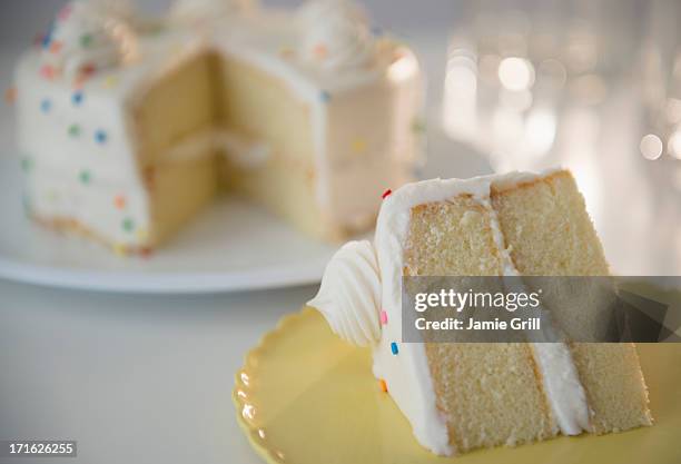 studio shot of birthday cake slices - birthday cake white background stock pictures, royalty-free photos & images