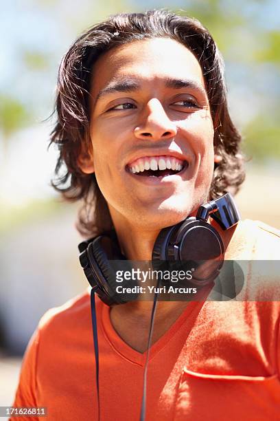 south africa, cape town, portrait of young man with headphones - headphone man on neck stock pictures, royalty-free photos & images