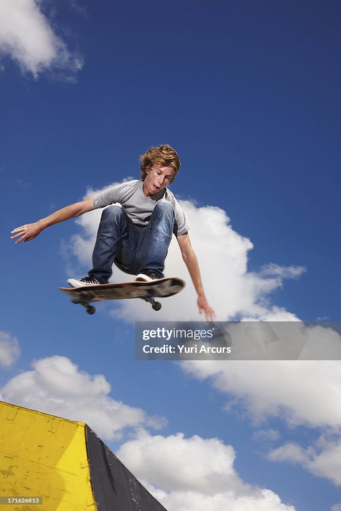 South Africa, Cape Town, Young man on skateboard jumping