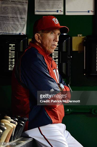 Manager Davey Johnson of the Washington Nationals reacts in the dugout while watching game two of a doubleheader against the Minnesota Twins at...