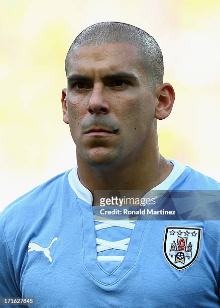 Maxi Pereira of Uruguay looks on prior to the FIFA Confederations Cup Brazil 2013 Semi Final match between Brazil and Uruguay at Governador Magalhaes...