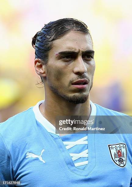 Martin Caceres of Uruguay looks on prior to the FIFA Confederations Cup Brazil 2013 Semi Final match between Brazil and Uruguay at Governador...