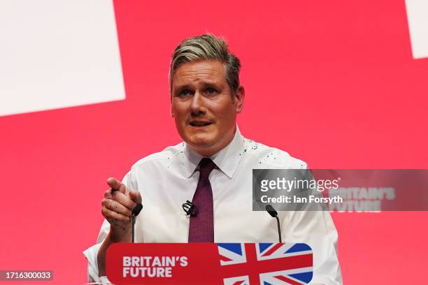 Labour party leader, Sir Keir Starmer delivers the leader's speech, covered in glitter after a protestor stormed the stage on the third day of the...