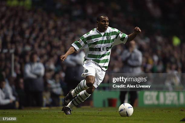 Didier Agathe of Celtic running with the ball during the Bank of Scotland Premier League match between Celtic and Dundee held on December 21, 2002 at...