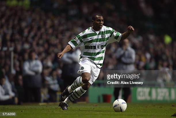 Didier Agathe of Celtic running with the ball during the Bank of Scotland Premier League match between Celtic and Dundee held on December 21, 2002 at...