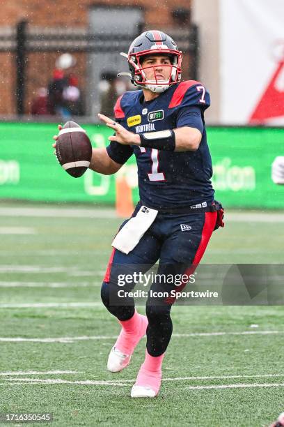 Montreal Alouettes quarterback Cody Fajardo considers his options with the ball during the Ottawa RedBlacks versus the Montreal Alouettes game on...