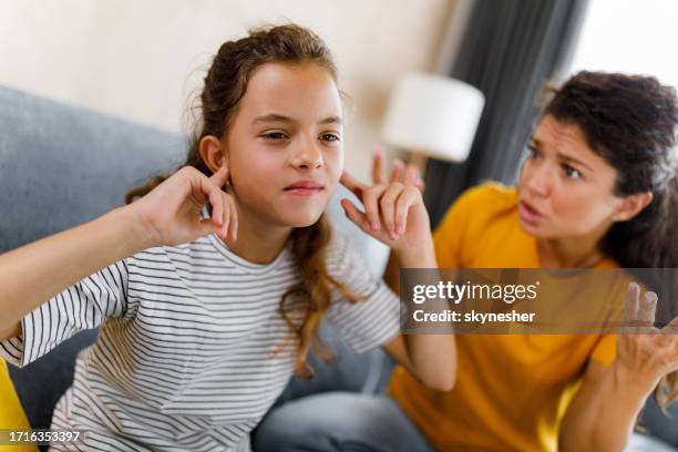 i don't want to listen to you mom! - stubborn stock pictures, royalty-free photos & images