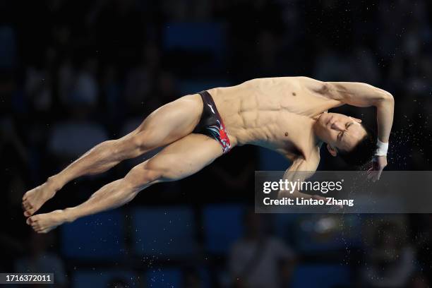 Yang Hao of China competes in the Men's 10m Platform Preliminary Diving event of the 19th Asian Games at Hangzhou Olympic Sports Centre on October...