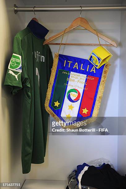 View of Gianluigi Buffon of Italy's kit alongside the Team pennant and Captain's armband, inside the Italian dressing room prior to the FIFA...