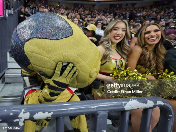 The Vegas Golden Knights mascot Chance the Golden Gila Monster reacts after Jacob MacDonald of the San Jose Sharks scored a power-play goal against...