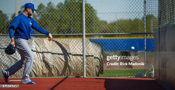 Luis Perez throws balls against a backstop. Toronto Blue Jays continue spring training. All players are now in camp. Live pitching began today,...