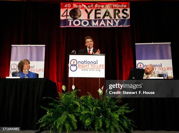 Texas Gov. Rick Perry speaks to the National Right to Life convention at the Hyatt Regency DFW International Airport Hotel June 27, 2013 in...