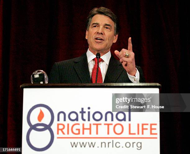 Texas Gov. Rick Perry speaks to the National Right to Life convention at the Hyatt Regency DFW International Airport Hotel June 27, 2013 in...