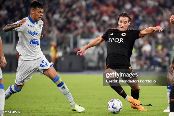 Enzo Barrenechea of Frosinone and Edoardo Bove of AS Roma compete for the ball during the Serie A football match between AS Roma and Frosinone Calcio...