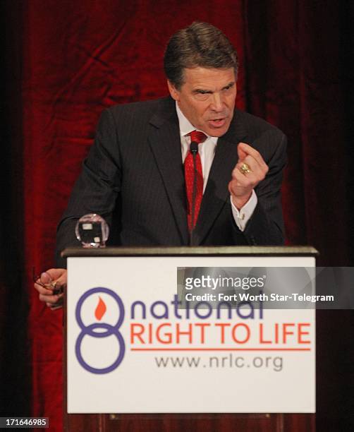 Gov. Rick Perry speaks during the general session of the 43rd annual National Right to Life Convention at the Hyatt Regency DFW International...