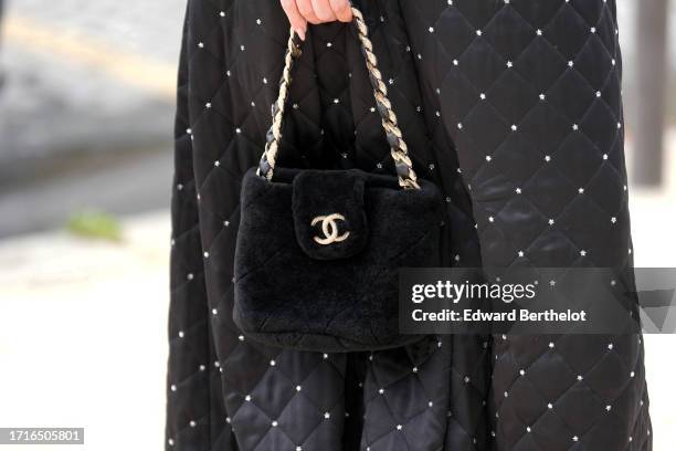 Chanel bag is seen, outside Chanel, during the Womenswear Spring/Summer 2024 as part of Paris Fashion Week on October 03, 2023 in Paris, France.