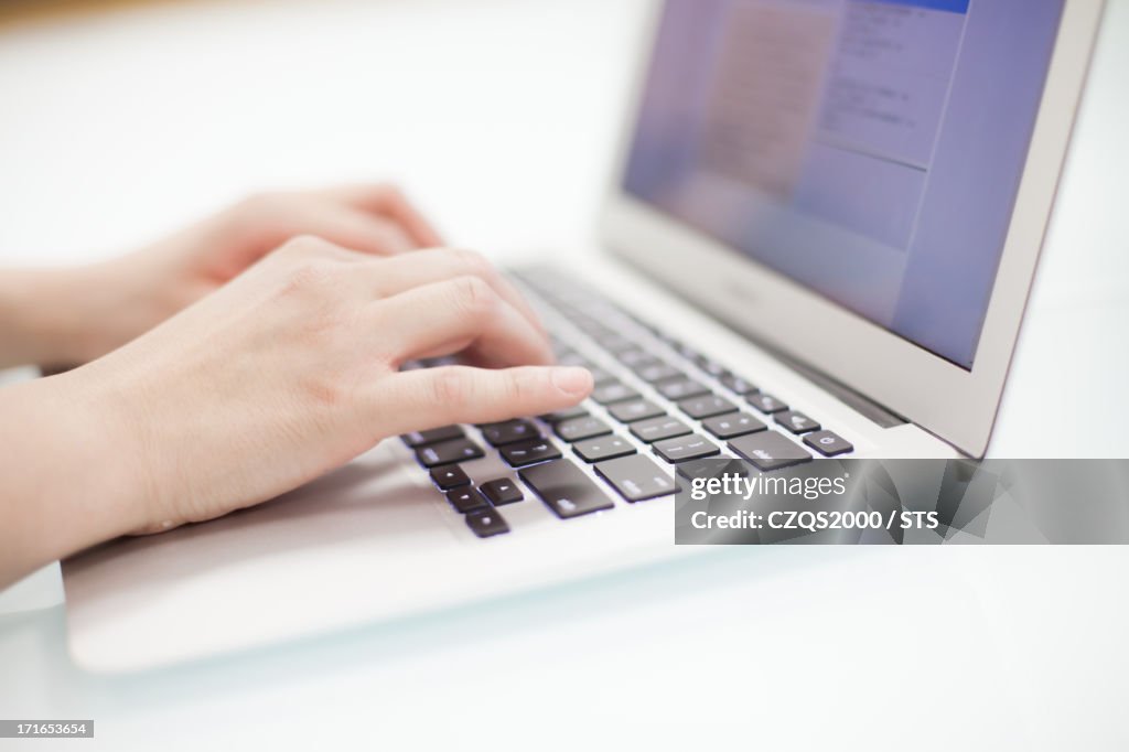 Woman using laptop