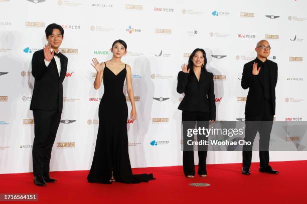 Jang Min-joon, Kwon So-hyun and Gang Tae-yoo arrive for the Opening Ceremony of the 28th Busan International Film Festival at Busan Cinema Center on...