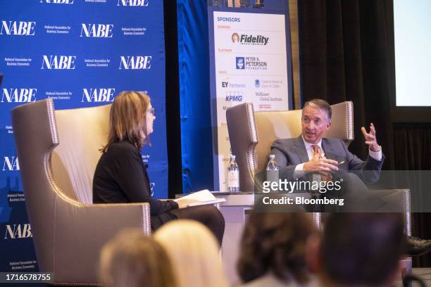 Jay Hartzell, president of The University of Texas at Austin, and Julia Coronado, founder and president at MacroPolicy Perspectives LLC, left, during...
