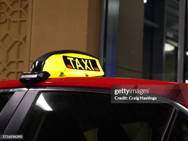 uae dubai, downtown, sign on taxi cab with copy space - dubai taxi stock pictures, royalty-free photos & images